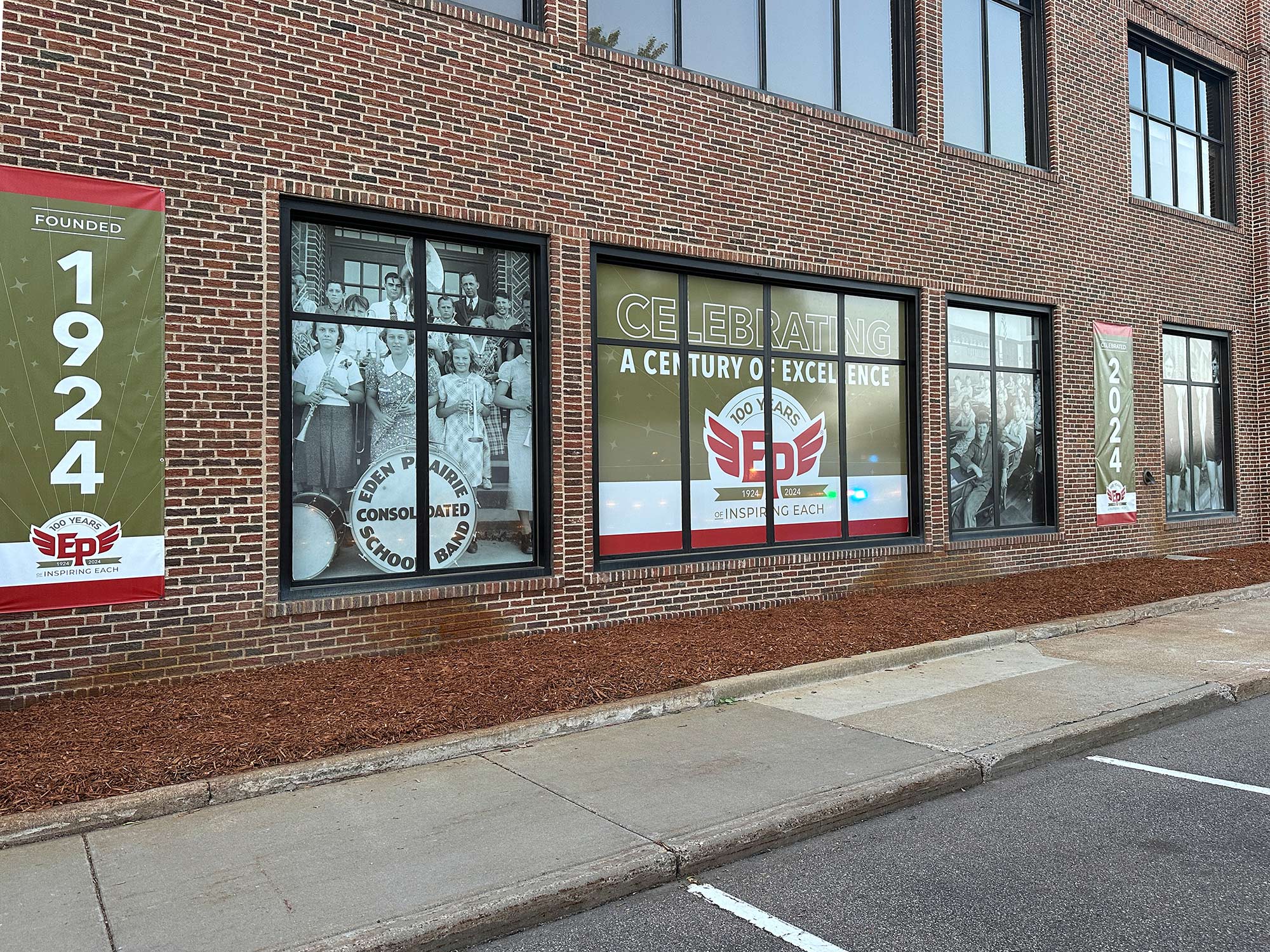 Eden Prairie Schools 100 year celebration exterior graphics designed by Schmitt Creative