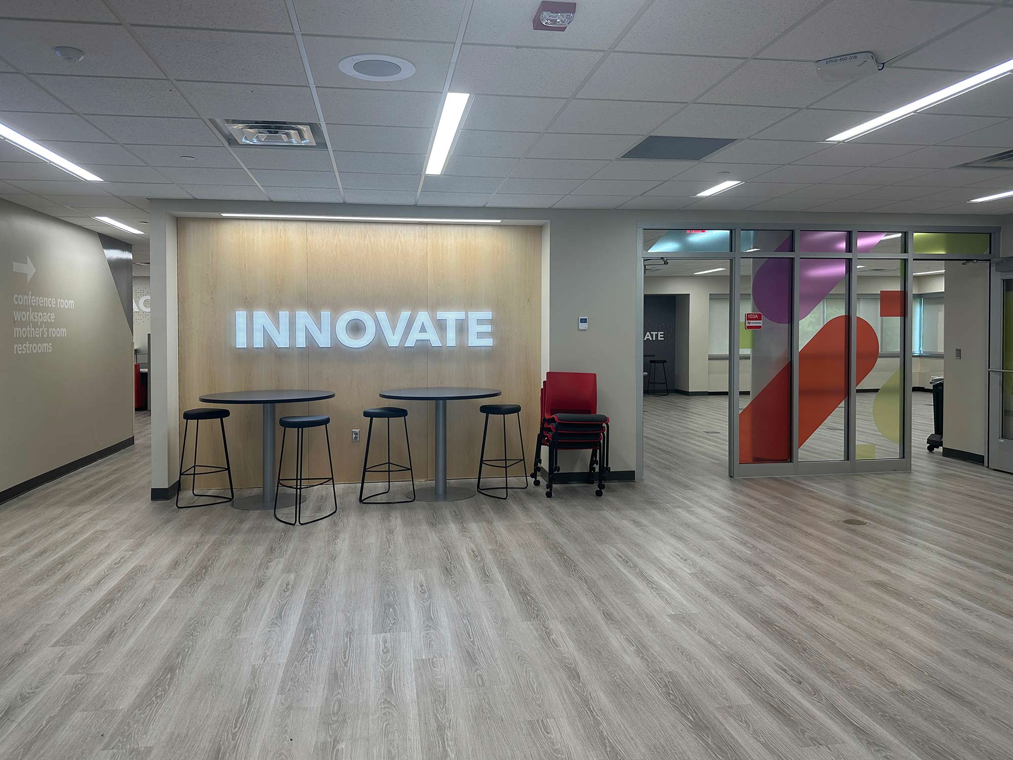 Lit sign and graphics at Eden Prairie Schools Innovation Sandbox in EP High School