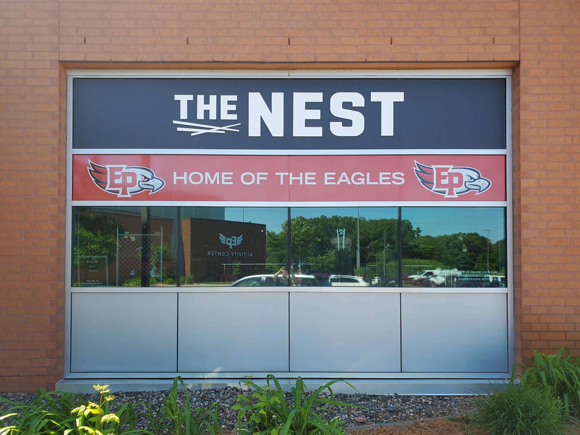 The Nest spirit store exterior graphics for Eden Prairie Schools Booster Association